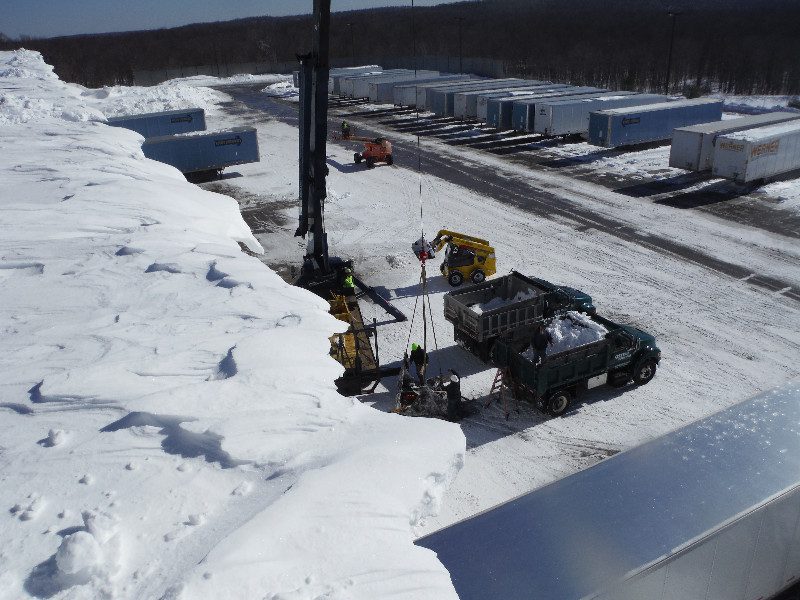 Snow Removal with Crane and Dump Truck