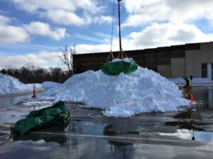 Rooftop Snow Removal using a crane