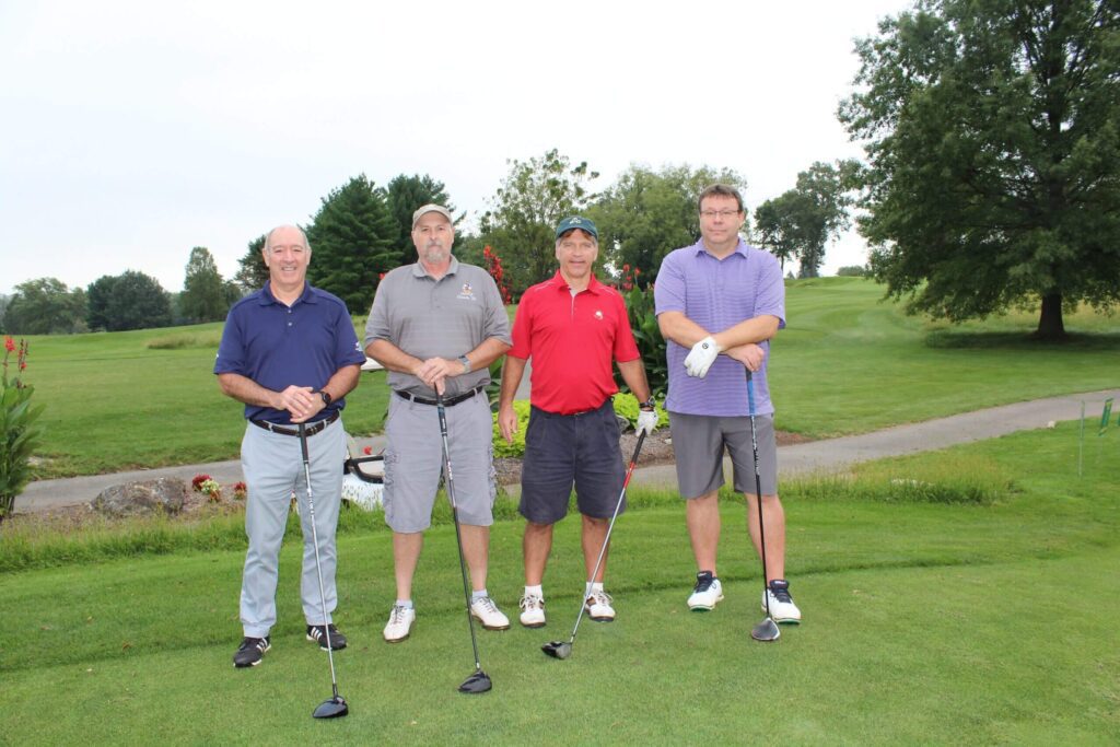 4 players at the Great Roof Giveaway Golf Outing