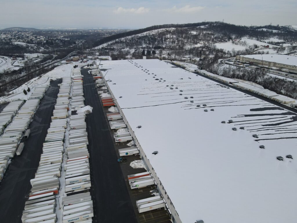 snow on walmart roof being removed safely