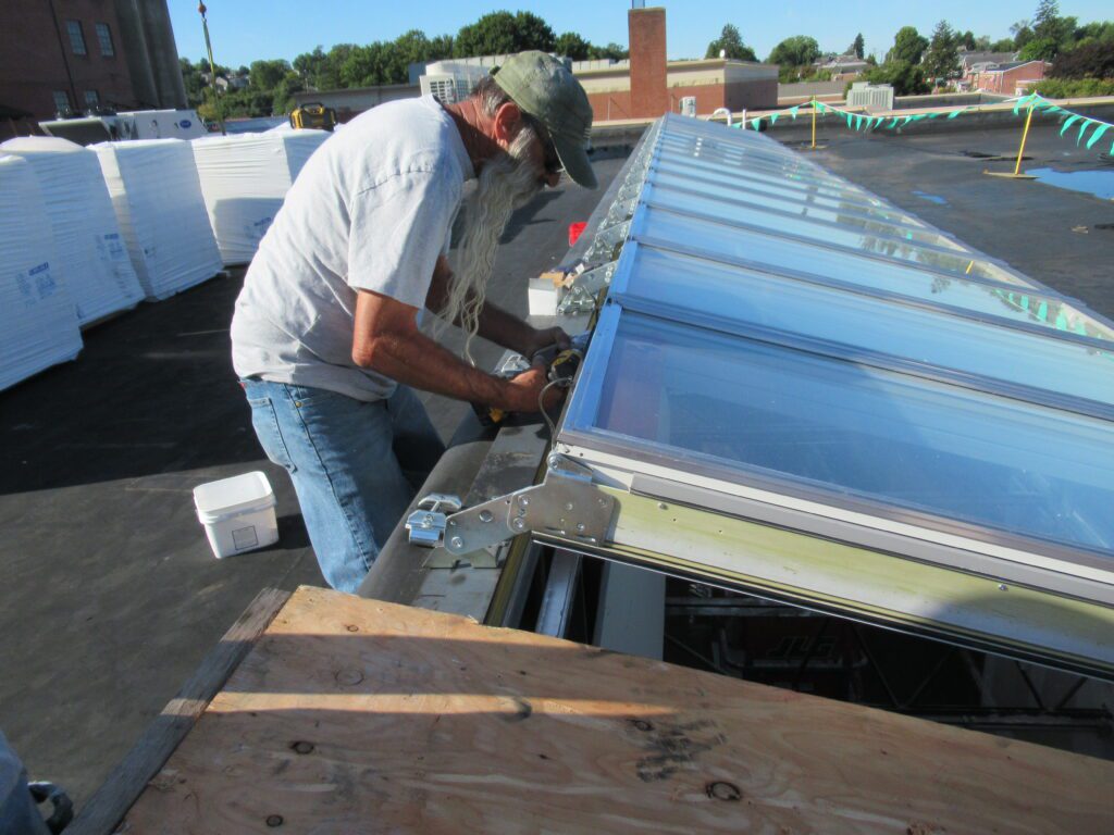 Re-roof, Installation of Siding, and Installation of Velux Modular Skylight Bays