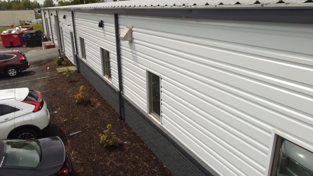 Lancaster Plumbing heating and cooling new metal siding close up