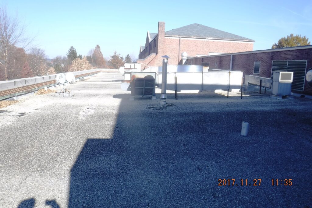 Commercial removal of units, duct work, and infilled the deck at F&M College