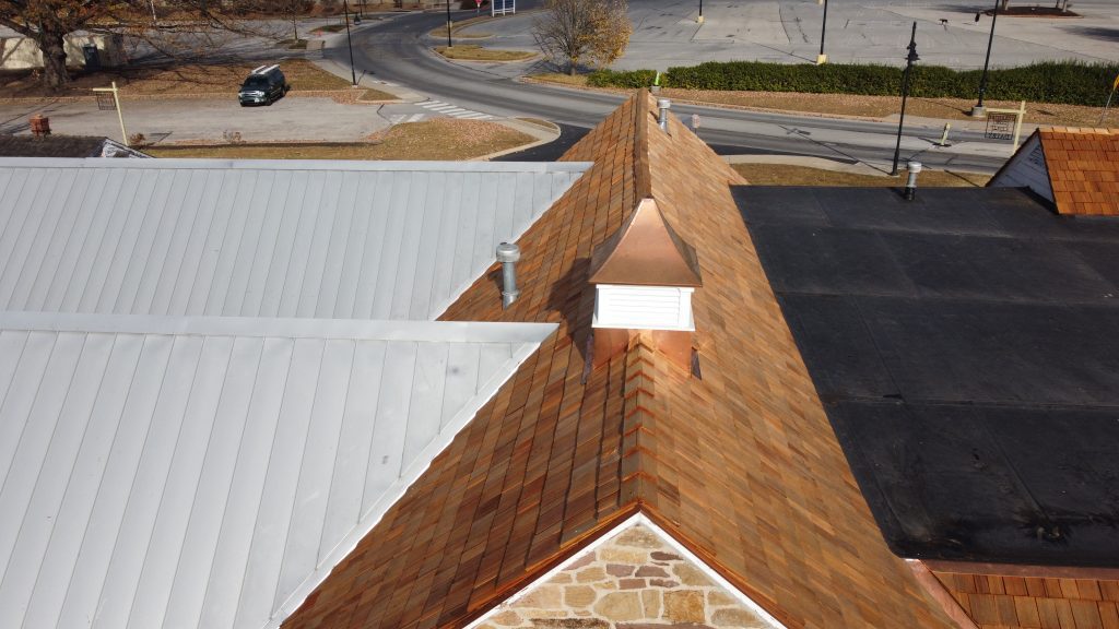 Top view of S&T Bank’s new cedar shingles and copper flashings after restoration by GSM Roofing.