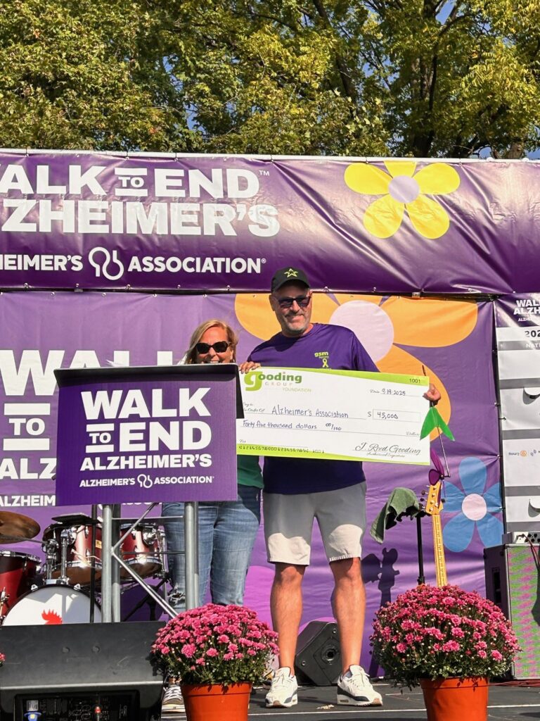 Reed Gooding presenting the Alzheimer's Association with a check from the Gooding Group Foundation for $45,000